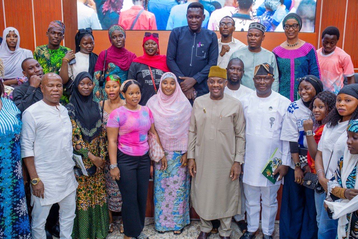 Young Nigerians with officials at an EIBIC engagement